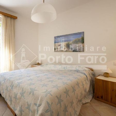 2 Pineta - Ampio Quadrilocale Sulla Spiaggia Di Porto Faro 帕劳 外观 照片