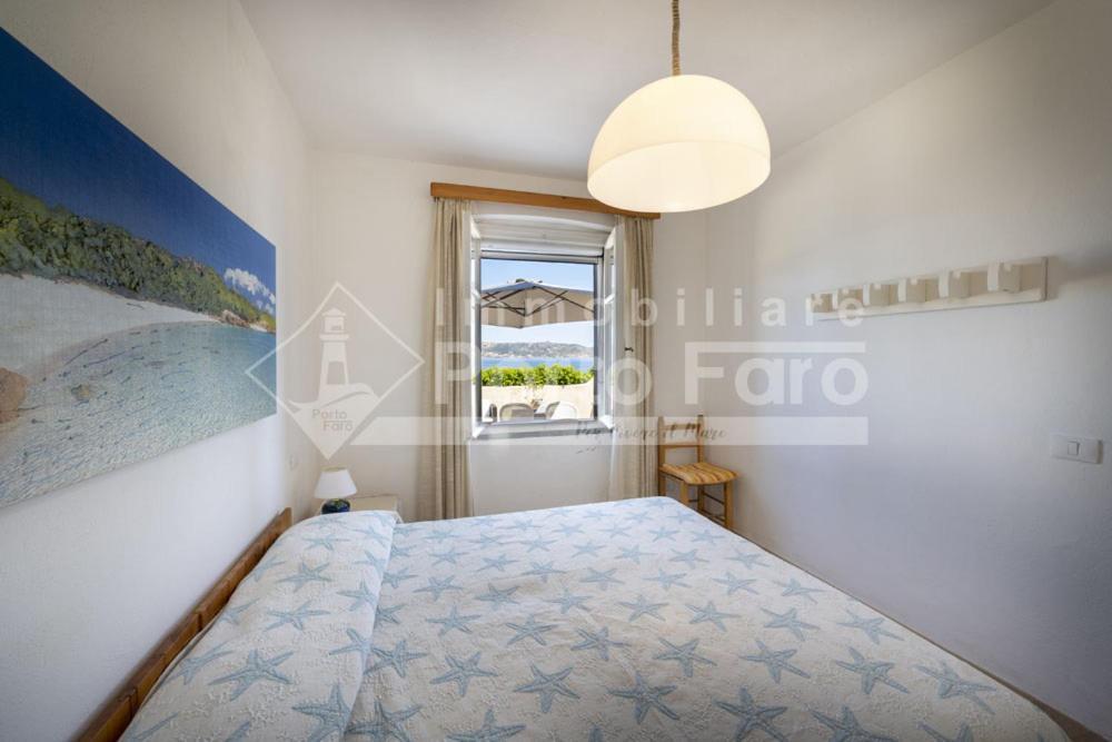 2 Pineta - Ampio Quadrilocale Sulla Spiaggia Di Porto Faro 帕劳 外观 照片